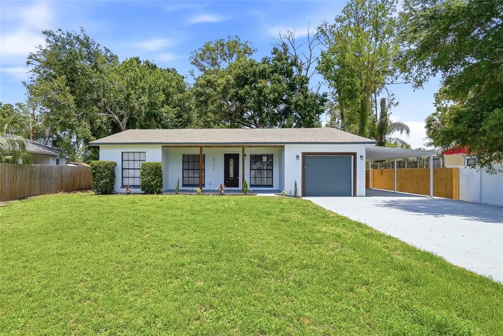 8709 FOUNTAIN AVENUE TAMPA, FL 33615