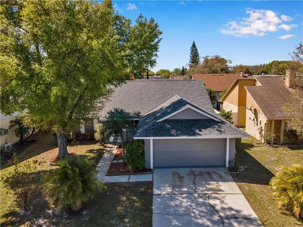 7110 HOLLOWELL DRIVE TAMPA, FL 33634