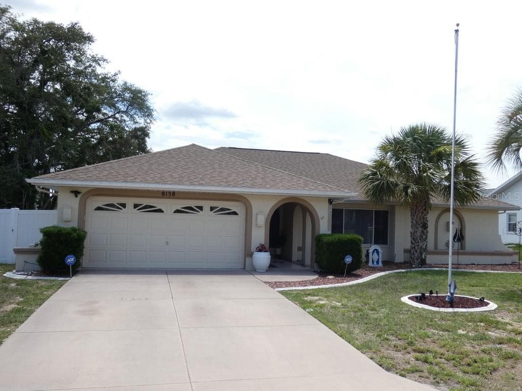 8158 WINDING OAK LANE SPRING HILL, FL 34606
