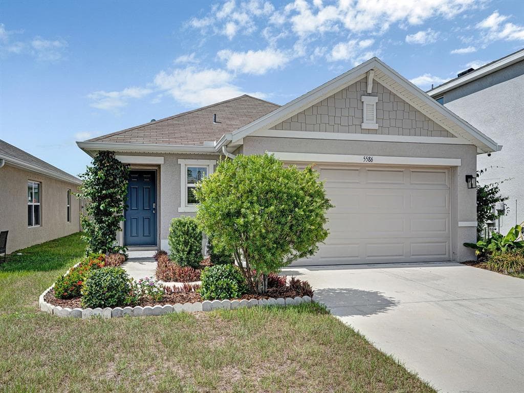 5586 LOGAN CAVE AVENUE WIMAUMA, FL 33598