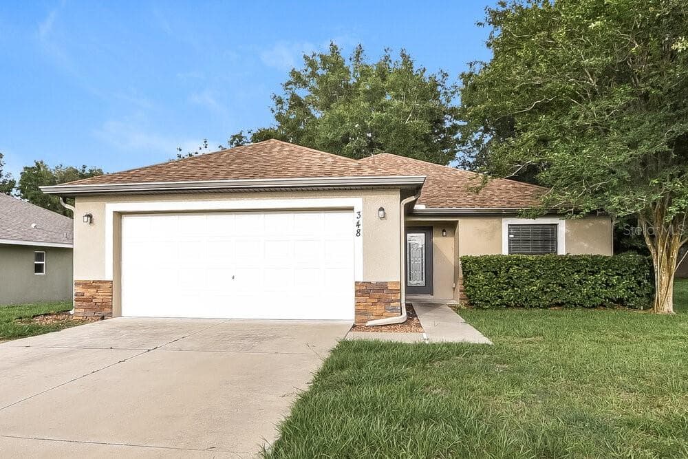 348 ASHTON WOODS LANE LEESBURG, FL 34748