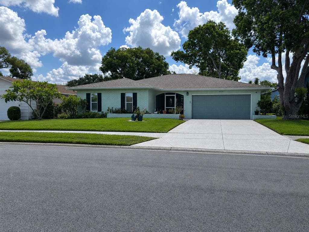 11214 ROLLINGWOOD DRIVE