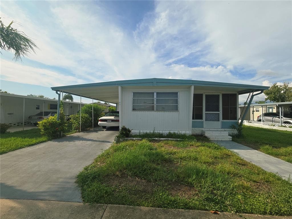 49 DRURY LANE TARPON SPRINGS, FL 34689