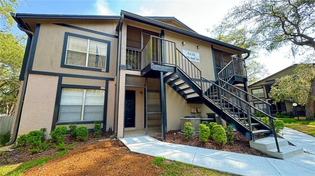 4032 TUMBLE WOOD TRAIL UNIT 104 TAMPA, FL 33613