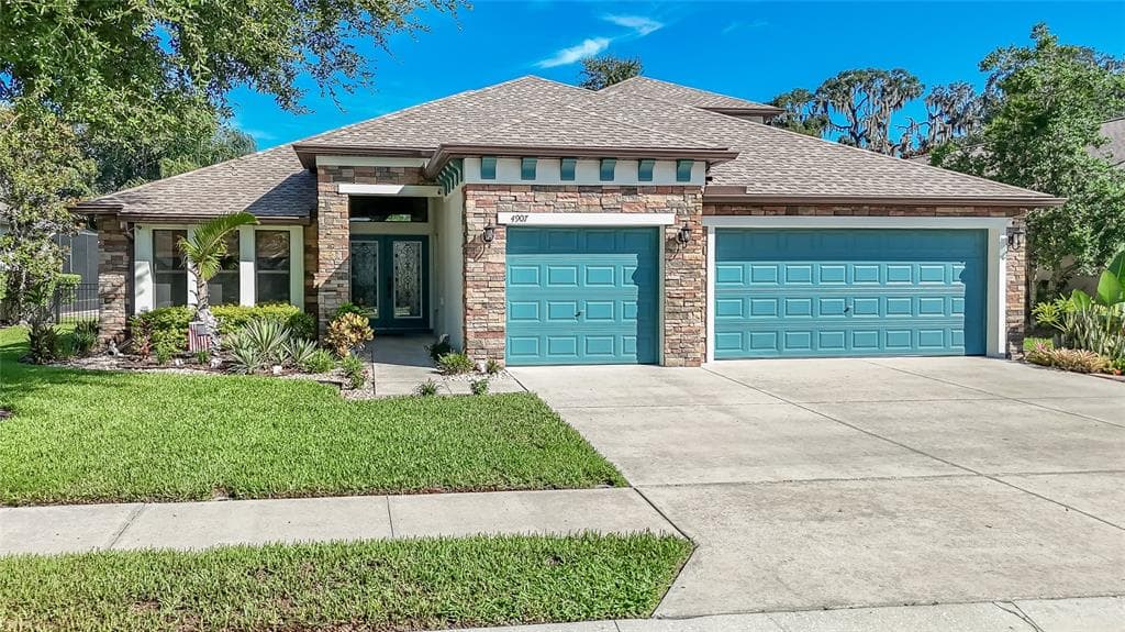4907 POINTE O WOODS DRIVE WESLEY CHAPEL, FL 33543