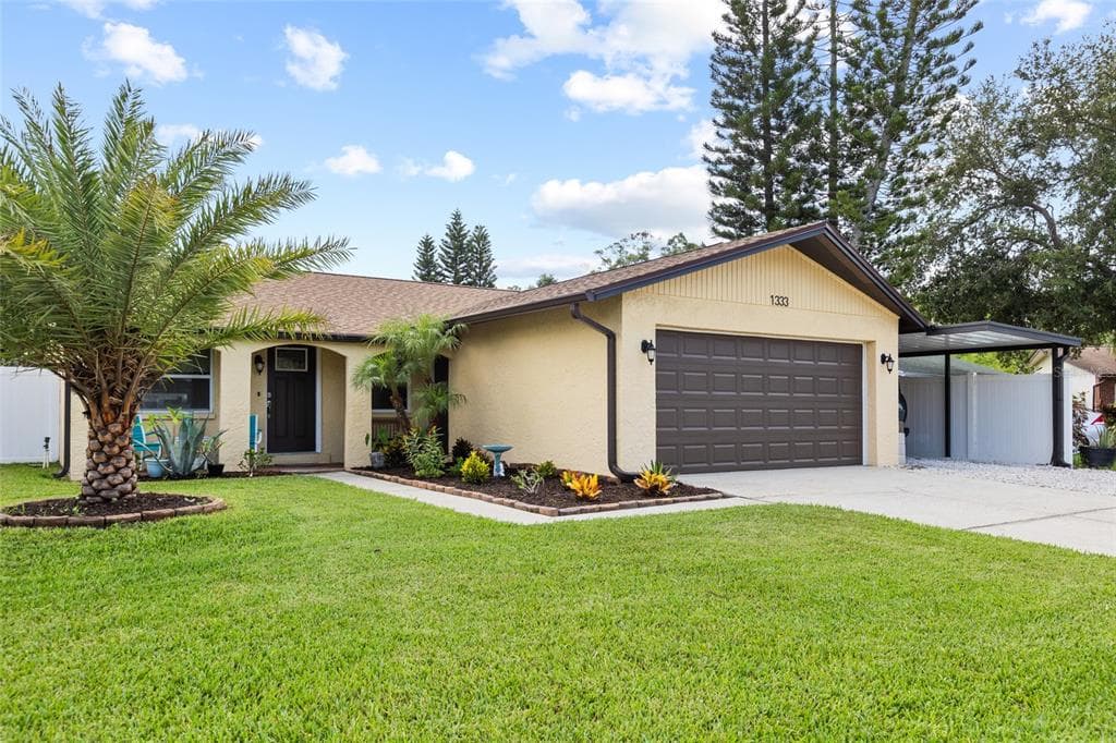 1333 WILDWOOD COURT DUNEDIN, FL 34698