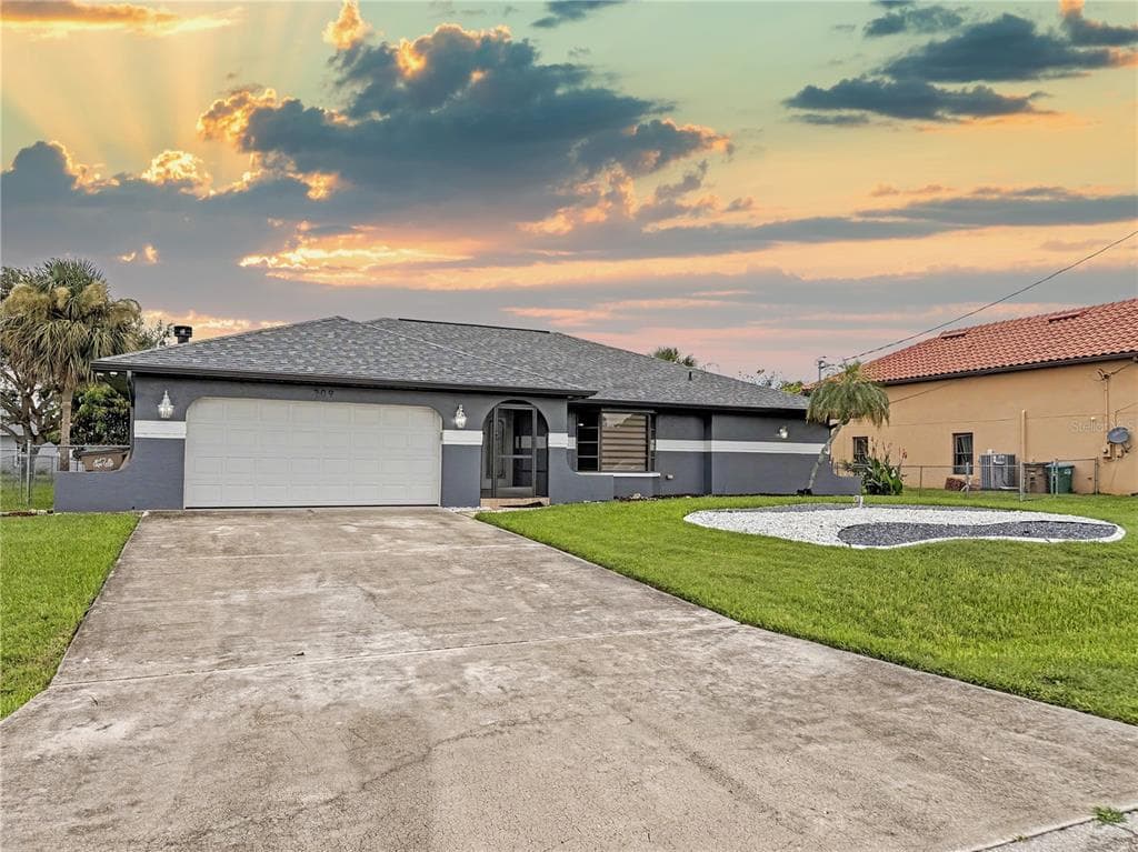 209 SW 42ND STREET CAPE CORAL, FL 33914