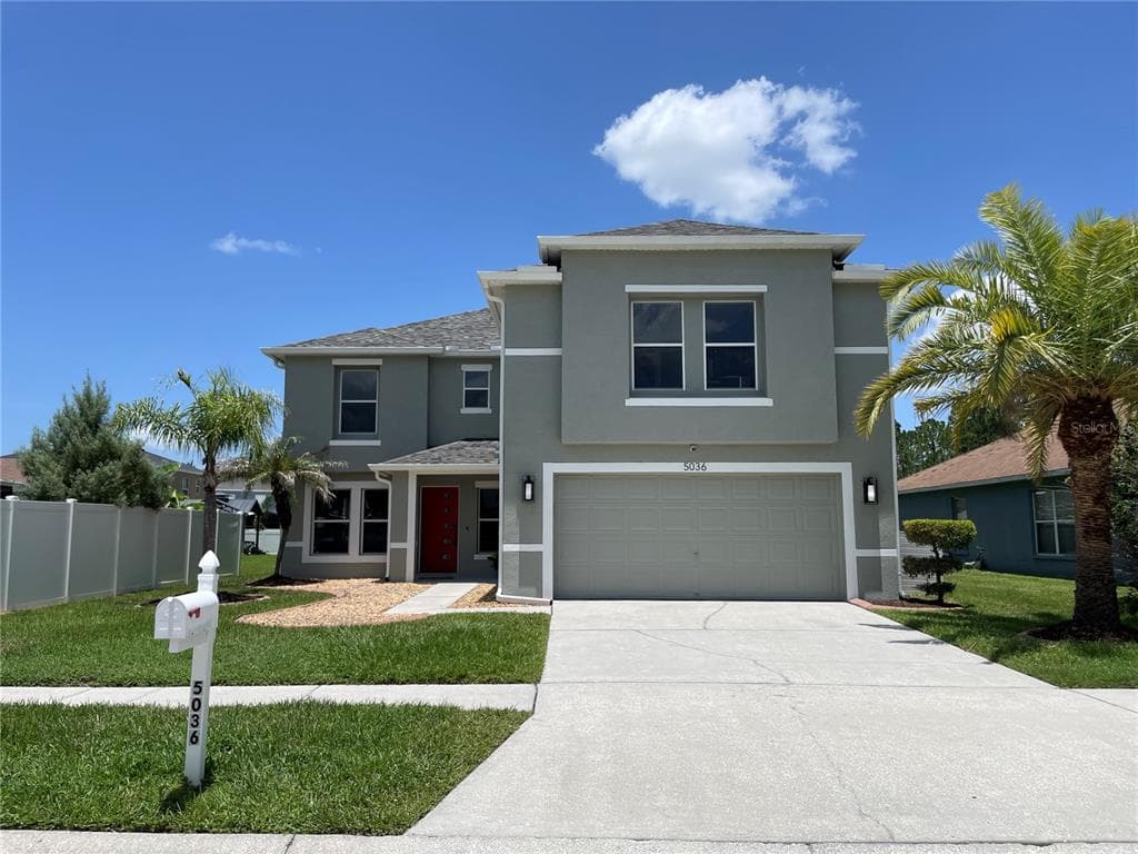 5036 WHISTLING PINES COURT