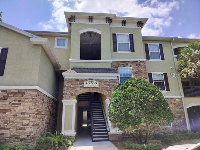 10205 COURTNEY PALMS BOULEVARD UNIT 101