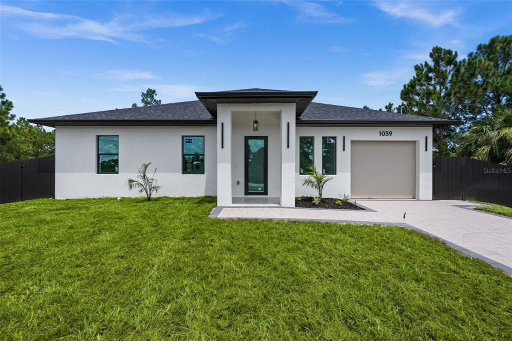 1039 BASSINGER AVENUE S LEHIGH ACRES, FL 33974