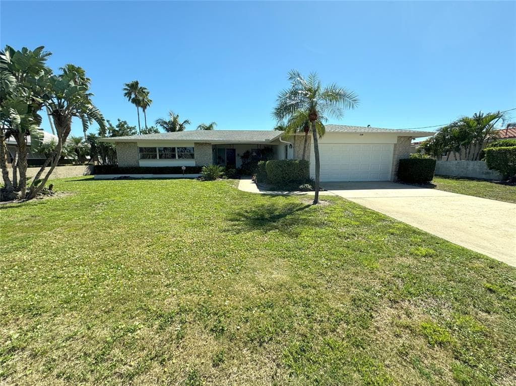 228 HOWARD DRIVE BELLEAIR BEACH, FL 33786