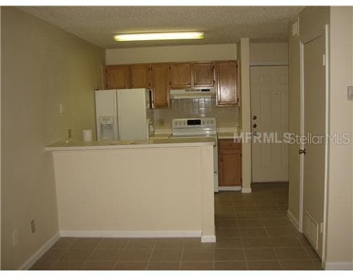 8672 KEY BISCAYNE DRIVE UNIT 106 TAMPA, FL 33614