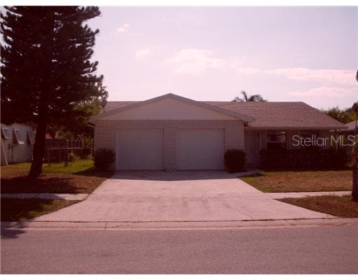 1404 SANDALWOOD DRIVE DUNEDIN, FL 34698