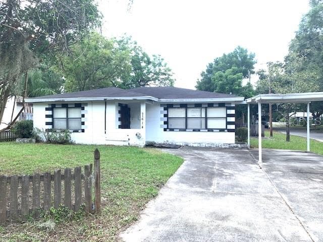 1614 E IDLEWILD AVENUE TAMPA, FL 33610