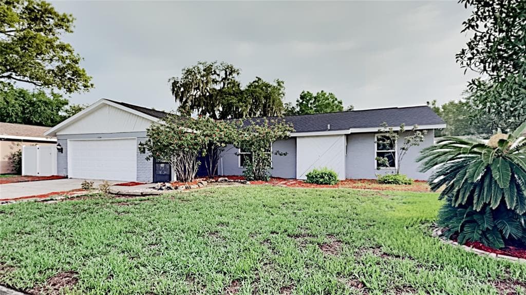 1304 RUSTLING OAKS DRIVE BRANDON, FL 33510
