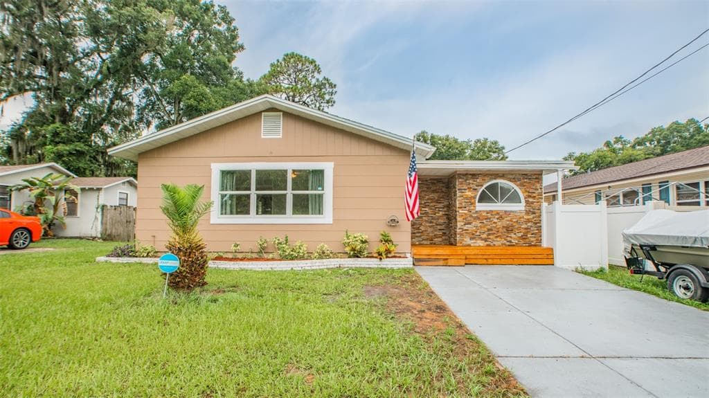 1603 E IDLEWILD AVENUE TAMPA, FL 33610