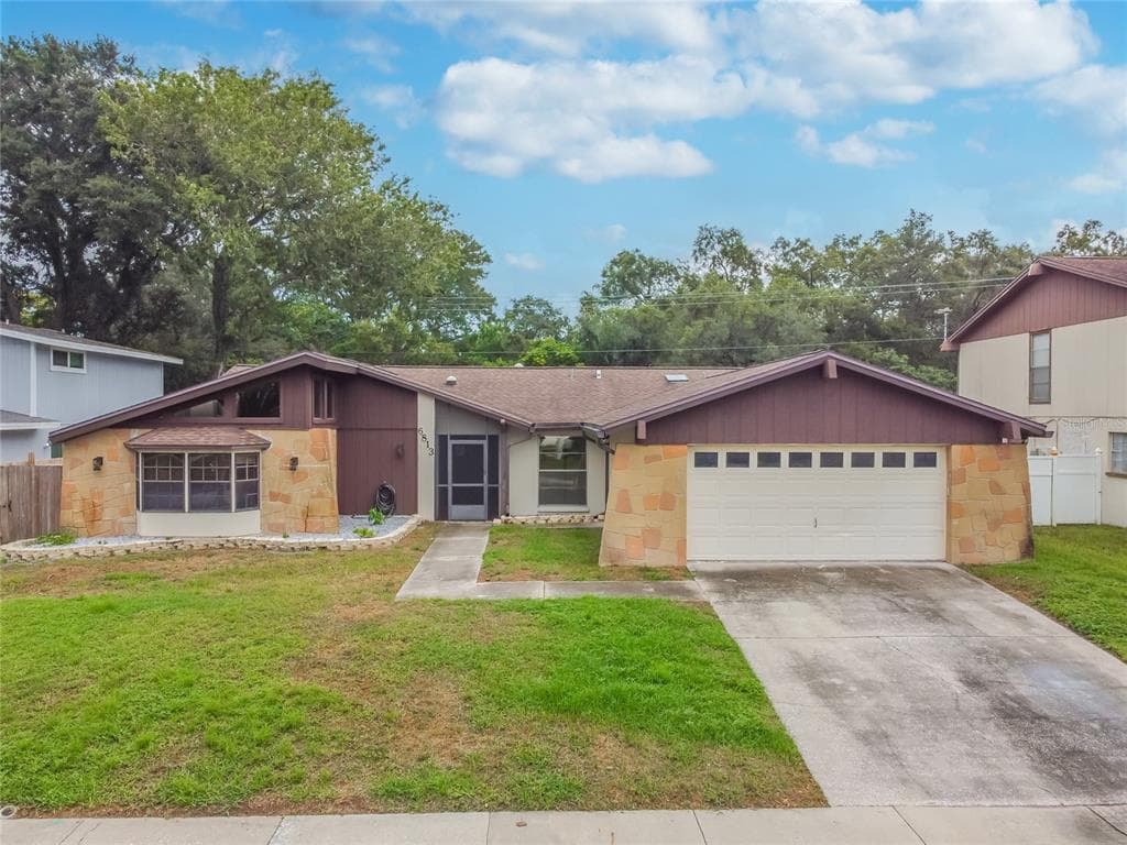 6813 MITCHELL CIRCLE TAMPA, FL 33634