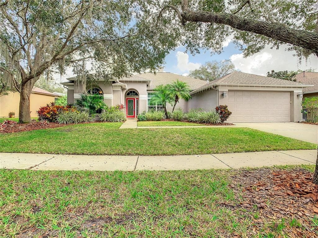 9409 HUNTERS POND DRIVE TAMPA, FL 33647