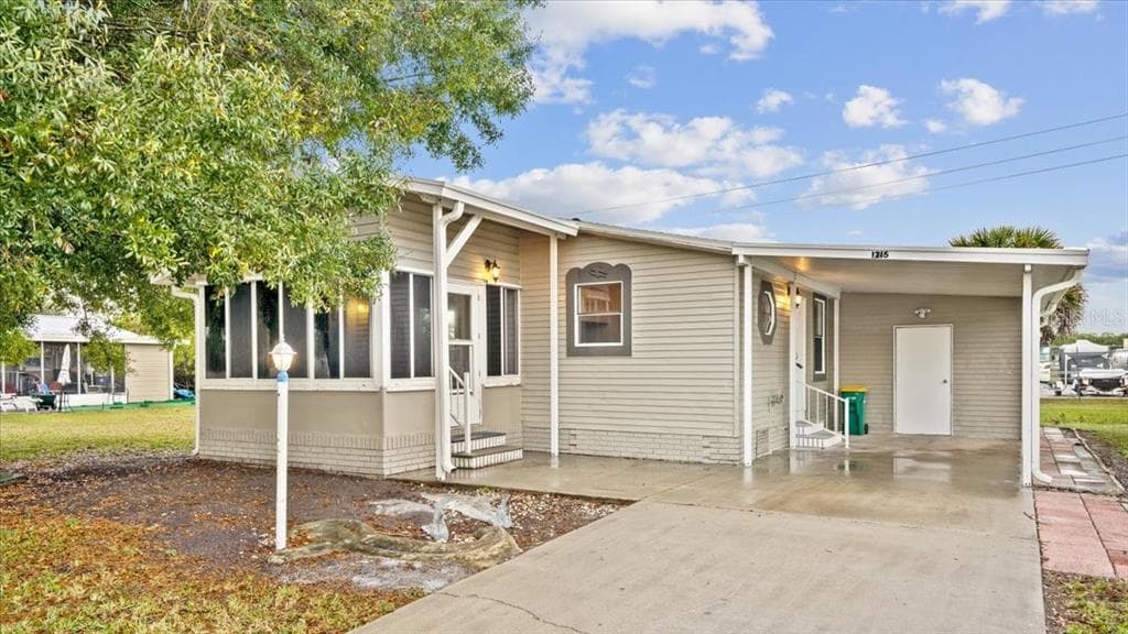 1215 CHIPEWA DRIVE BAREFOOT BAY, FL 32976