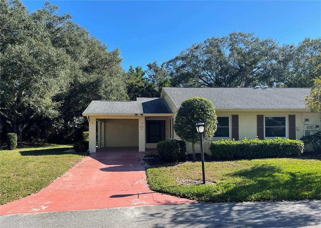 1801 FOXHUNT DRIVE UNIT A SUN CITY CENTER, FL 33573