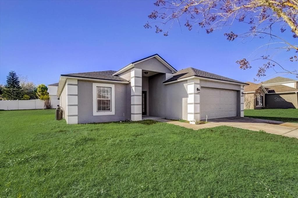 1913 THORNGATE LANE MASCOTTE, FL 34753