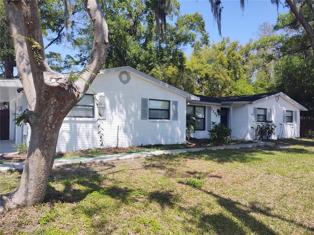 1232 DEBUEL ROAD LUTZ, FL 33549