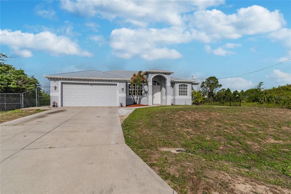 1605 ROBERT AVENUE LEHIGH ACRES, FL 33972