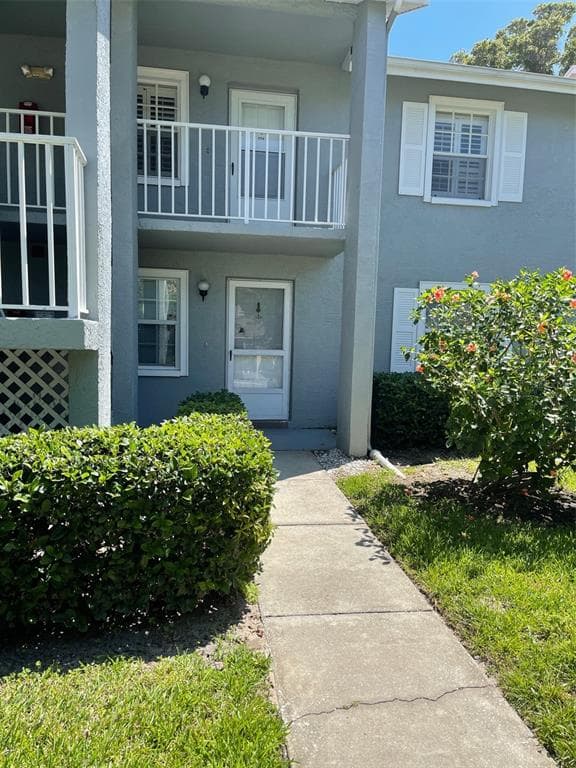 1465 MILLSTREAM LANE UNIT #104 DUNEDIN, FL 34698