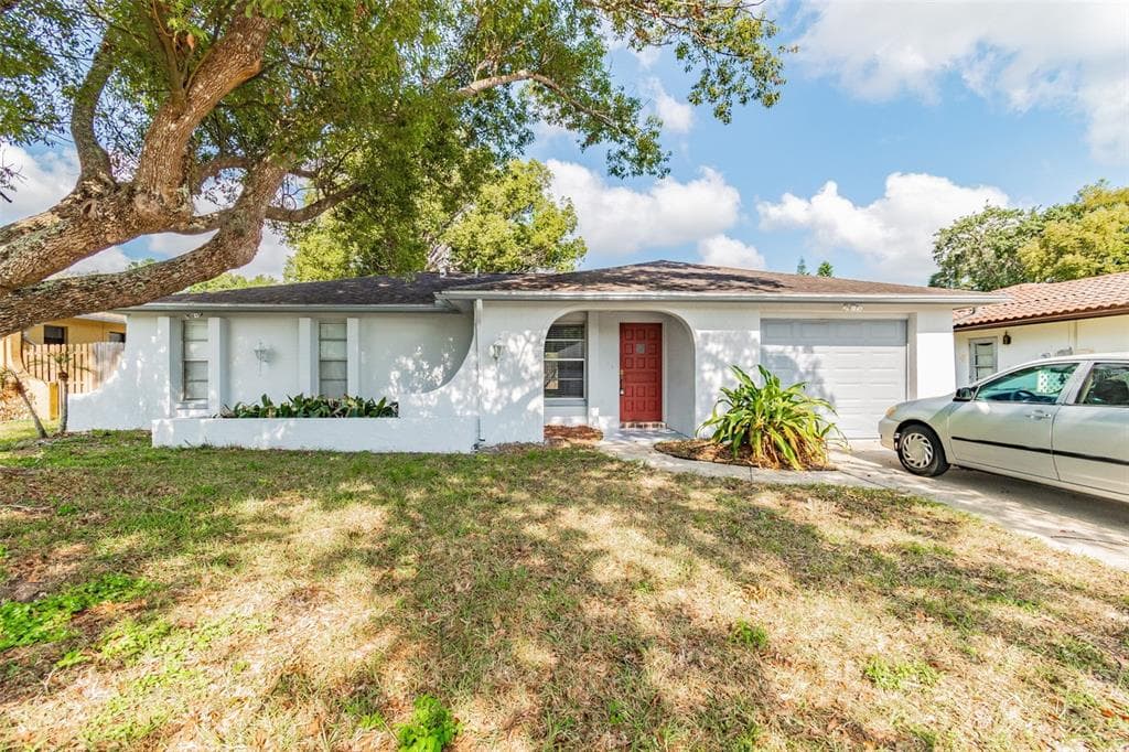 1711 COSMOS DRIVE HOLIDAY, FL 34690