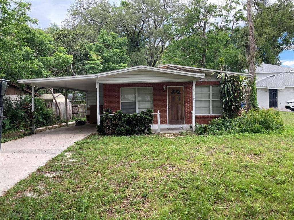 11707 NORTH DRIVE TAMPA, FL 33617