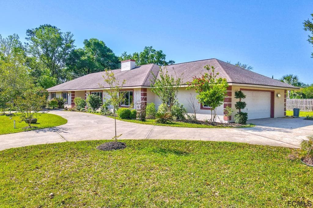 16 WESTROBIN LANE PALM COAST, FL 32164