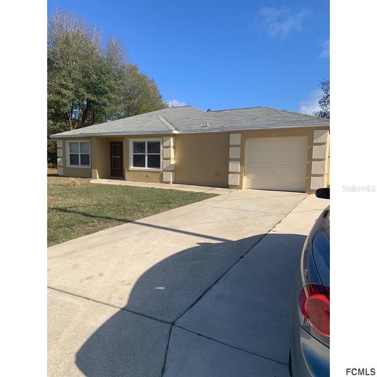 38 WHITE DOVE LANE PALM COAST, FL 32164