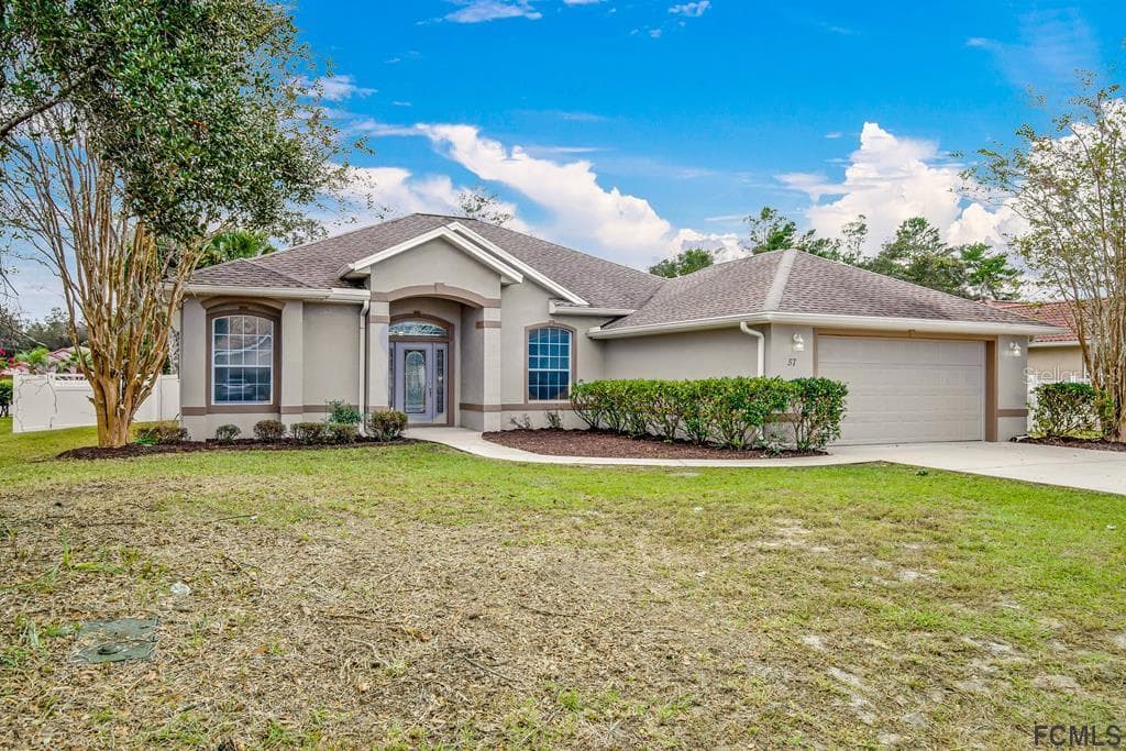 57 FREEPORT LANE PALM COAST, FL 32137