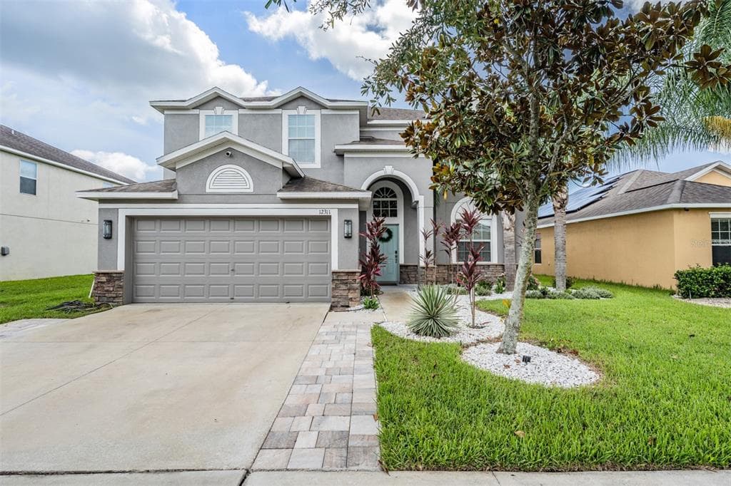 12311 HOLMWOOD GREENS PLACE