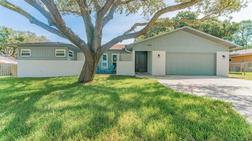 1403 RED OAK DRIVE TARPON SPRINGS, FL 34689