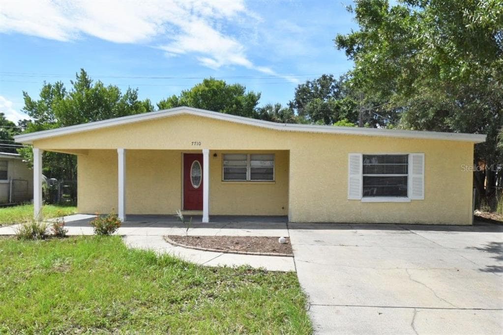 7710 BROOKSIDE LANE TAMPA, FL 33615
