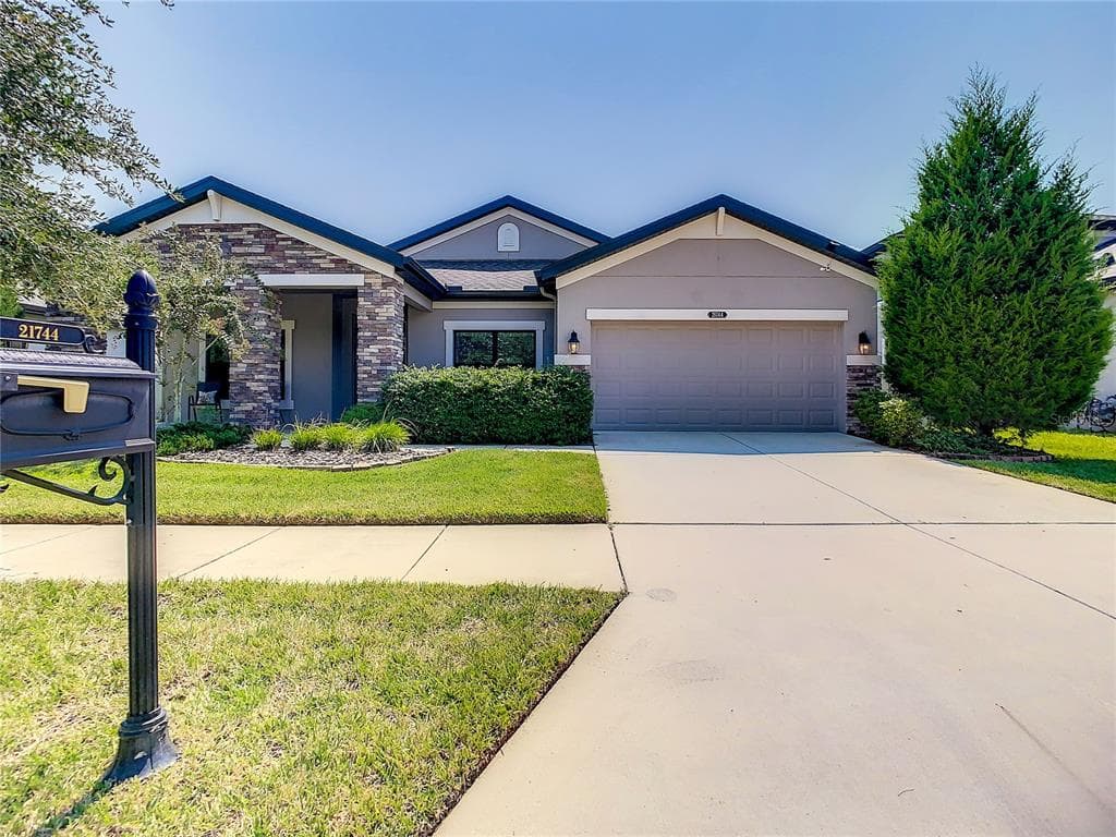 21744 INDIAN SUMMER DRIVE LAND O LAKES, FL 34637