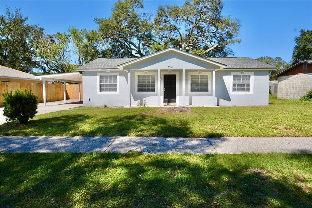 7018 FLINT DRIVE TAMPA, FL 33619