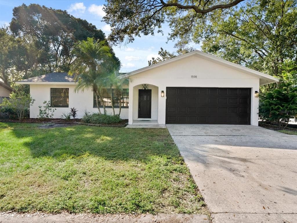 1598 SANDALWOOD DRIVE DUNEDIN, FL 34698