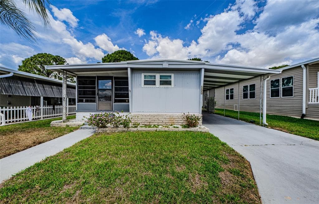 155 MELODY LANE TARPON SPRINGS, FL 34689