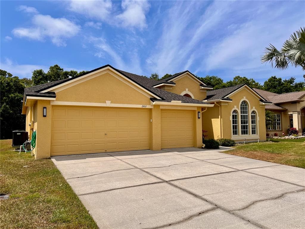 2411 WOOD POINTE DRIVE