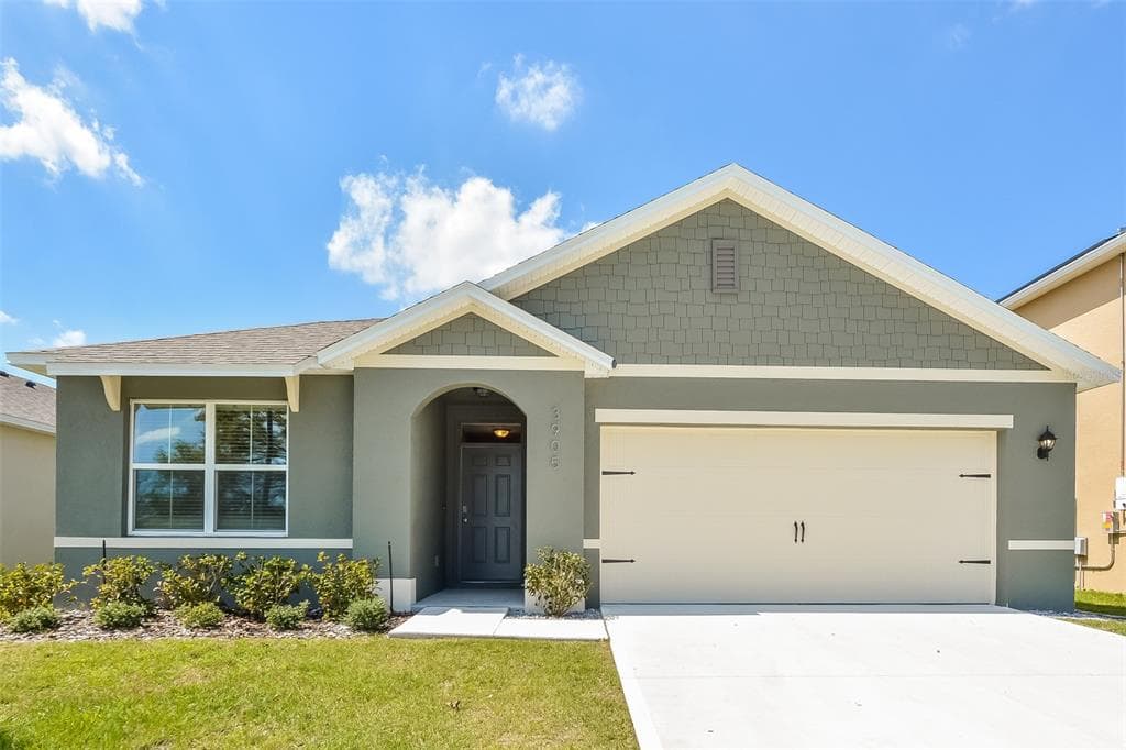 3905 CRIMSON CLOVER DRIVE MOUNT DORA, FL 32757