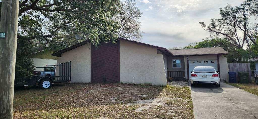 10713 N OJUS DRIVE TAMPA, FL 33617