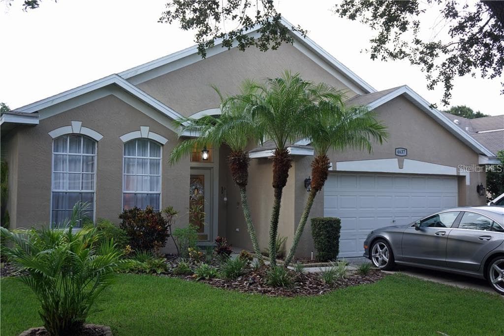 4637 WHISPERING WIND AVENUE TAMPA, FL 33614