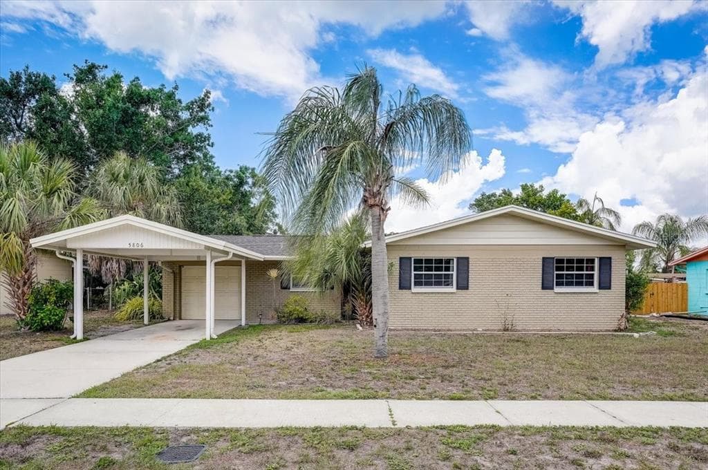 5806 OXFORD DRIVE TAMPA, FL 33615