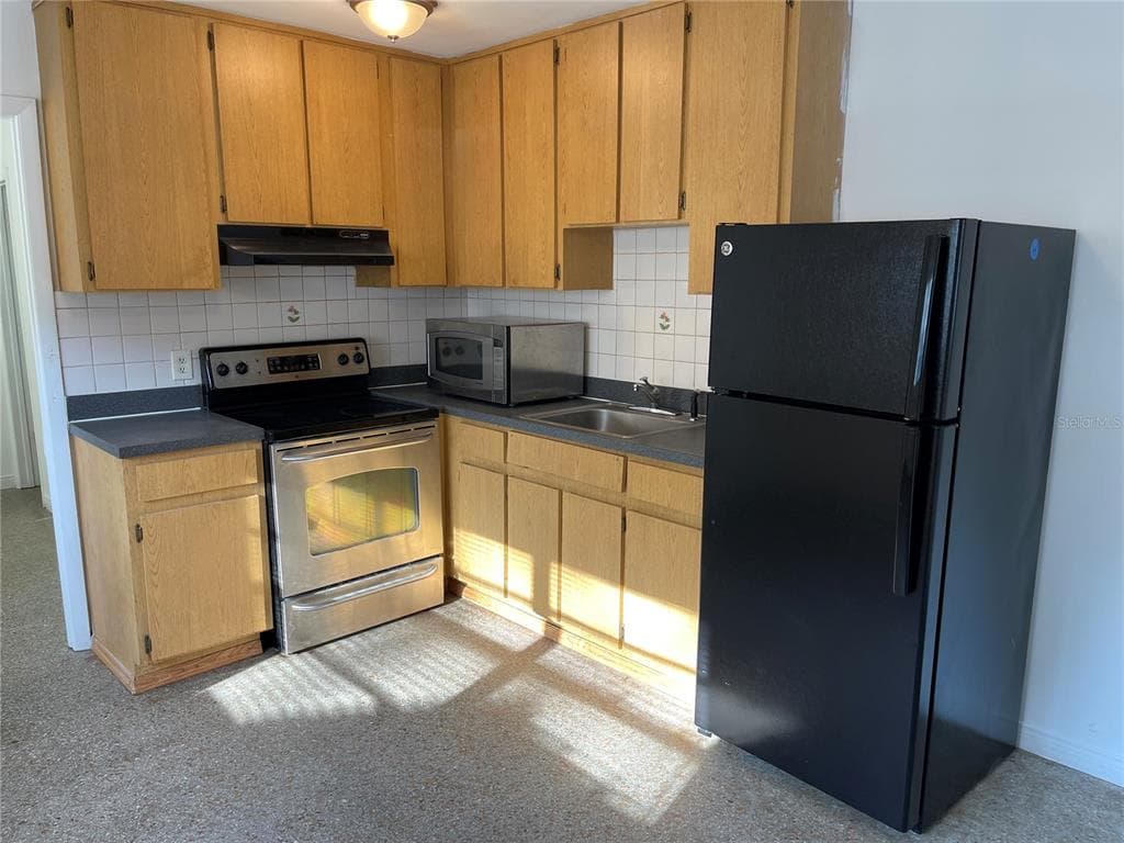 1209 E 122ND AVENUE UNIT B TAMPA, FL 33612