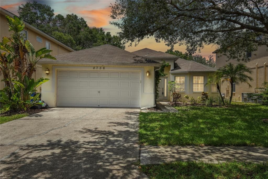 4756 WHISPERING WIND AVENUE TAMPA, FL 33614