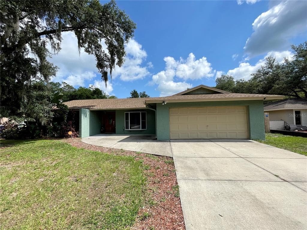 1216 WILDROSE DRIVE LUTZ, FL 33549
