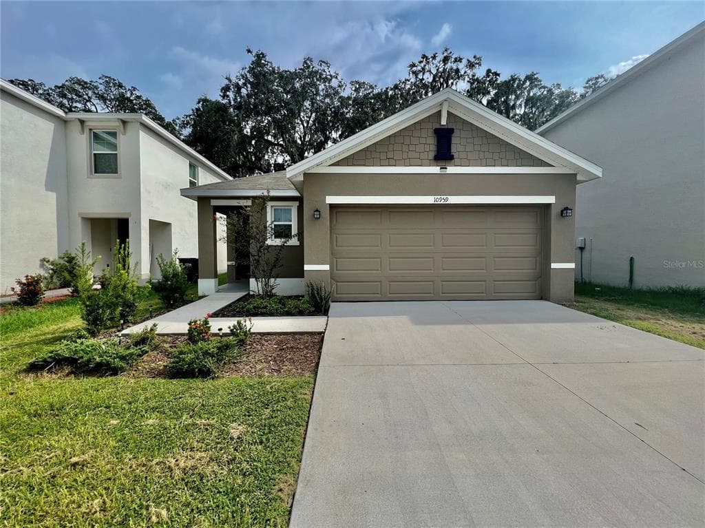 10959 TRAILING VINE DRIVE TAMPA, FL 33610