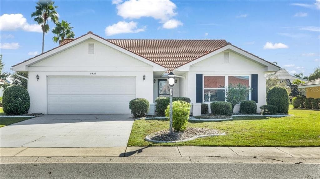 1921 WOLF LAUREL DRIVE SUN CITY CENTER, FL 33573